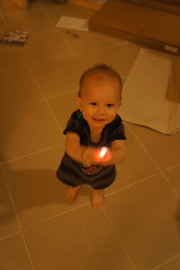 Holding a lantern light that was from the Kaohsiung lantern festival paper dragon. 